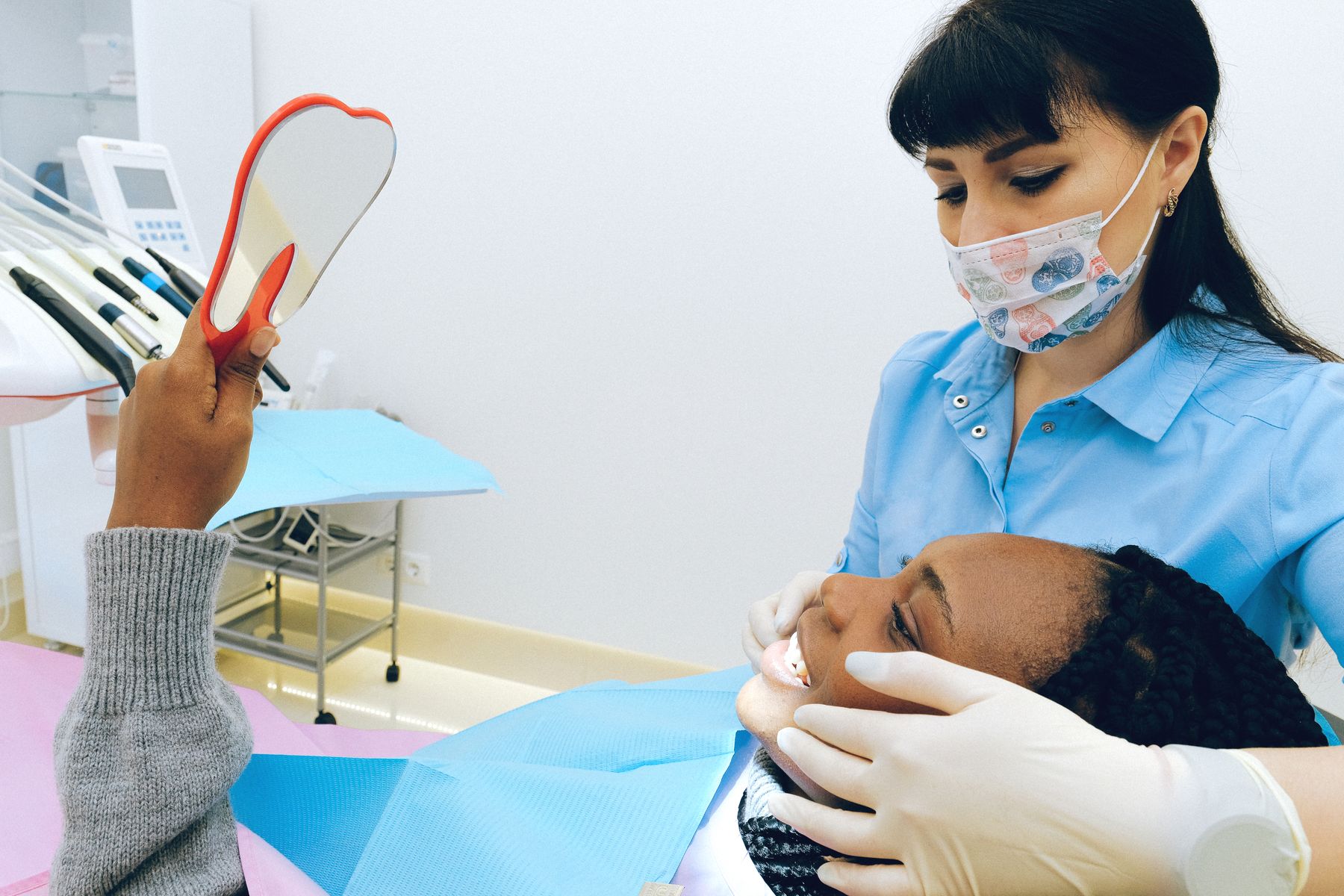 Dental mirror used during a smile examination
